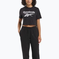 Koszulka Reebok Identity Big Logo Crop Tee. Czarne bluzki damskie REEBOK FITNESS, bez wzorów, bez kołnierzyka. Za 69.99 zł.