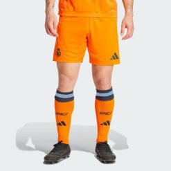 Szorty Real Madrid 24/25 Away. Brązowe szorty męskie Adidas, z materiału, bez kołnierzyka. W wyprzedaży za 139.30 zł.