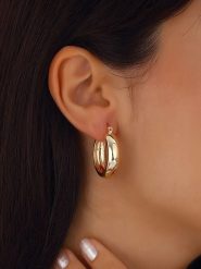 Nakkash Pozłacane kolczyki-kreole rozmiar: onesize. Żółte kolczyki damskie Nakkash, pozłacane. Za 56.66 zł.