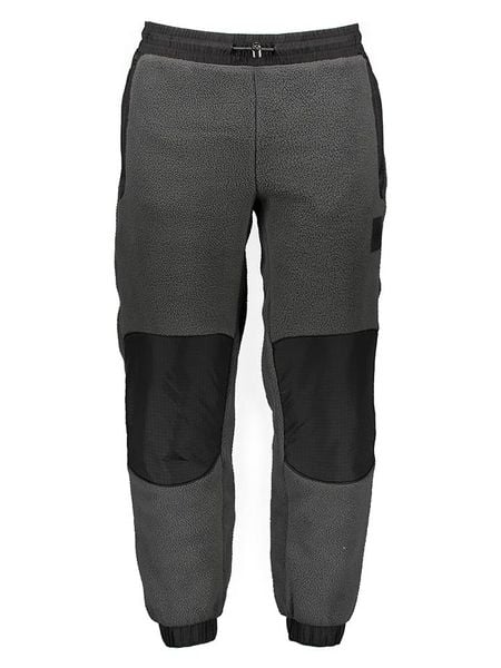 The North Face Spodnie polarowe "Fleeski" w kolorze szaro-czarnym rozmiar: M. Czarne spodnie materiałowe męskie The North Face, bez wzorów, z polaru. Za 318.37 zł.