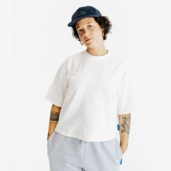 Koszulka Crop damska. Białe t-shirty damskie Decathlon, xl, bez wzorów, z bawełny, bez kołnierzyka. Za 54.99 zł.