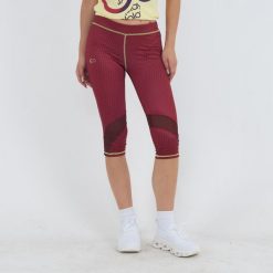 Legginsy treningowe 3/4 ASYR damskie. Czerwone legginsy damskie ELPLAYER, bez wzorów, na fitness i siłownię. W wyprzedaży za 68.00 zł.
