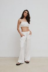 Luźne spodnie z muślinu w kolorze ECRU - COIRO-M. Spodnie materiałowe damskie Marsala, bez wzorów, z bawełny, eleganckie. Za 189.90 zł.