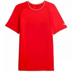 Koszulka Wilson Team. Czerwone t-shirty damskie Wilson, m, bez wzorów, z materiału, bez kołnierzyka. Za 159.00 zł.