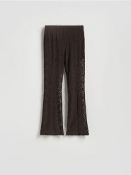 Spodnie plażowe - ciemnobrązowy. Brązowe spodnie materiałowe damskie Reserved, bez wzorów, z tkaniny. Za 139.99 zł.