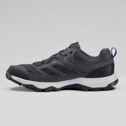 Buty turystyczne męskie Quechua MH100. Niebieskie buty trekkingowe męskie QUECHUA, z kauczuku, bez zapięcia, trekkingowe. Za 179.99 zł.