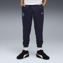Młodzieżowe spodnie Manchester City FtblEssentials PUMA. Niebieskia spodnie sportowe damskie Puma, m, do piłki nożnej. Za 219.00 zł.