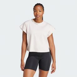 Koszulka Studio. Fioletowe bluzki sportowe damskie Adidas, xs, bez wzorów, z materiału, bez ramiączek. W wyprzedaży za 142.00 zł.