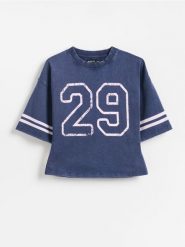 T-shirt z efektem sprania - niebieski. Niebieskie koszulki dziewczęce Reserved, bez wzorów, z bawełny, bez ramiączek. Za 32.99 zł.