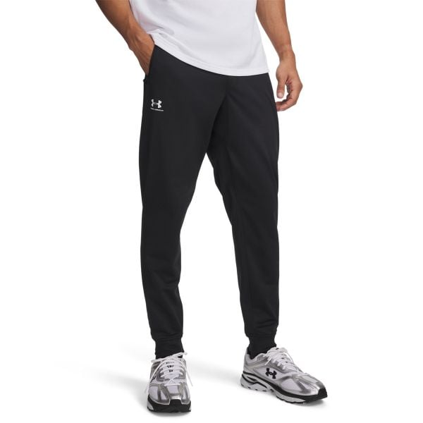 Spodnie dresowe treningowe męskie Under Armour Tricot Jogger (1290261-001). Czarne spodnie dresowe męskie Under Armour, bez wzorów, z dresówki. Za 159.99 zł.