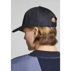 Czapka ftblMONOCHROME Manchester City PUMA New Navy Marine Blue. Niebieskie czapki męskie Puma, bez wzorów, eleganckie. W wyprzedaży za 154.00 zł.