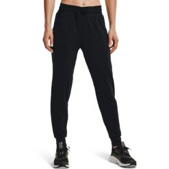Spodnie Under Armour HeatGear, Kobiety. Czarne spodnie dresowe damskie Under Armour, z poliesteru, na fitness i siłownię. Za 322.00 zł.