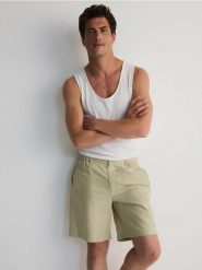 Szorty relaxed jogger - jasnozielony. Zielone szorty męskie Reserved, z bawełny, bez kołnierzyka. W wyprzedaży za 89.99 zł.