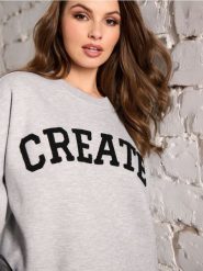 Bluza z napisem - szary. Szare bluzy bez kaptura damskie Sinsay, l. Za 49.99 zł.