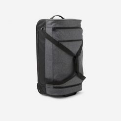 Torba podróżna na kółkach 70 l. Czarne torebki klasyczne damskie Decathlon, bez wzorów, z tkaniny, bez dodatków. Za 249.99 zł.