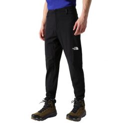 Spodnie turystyczne męskie The North Face Speedlight Slim Tapered. Czarne spodnie materiałowe męskie The North Face, bez wzorów, sportowe. Za 451.00 zł.