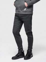 Spodnie męskie jeansowe joggery ze ściagaczem w pasie - czarne V4 - Rozmiar: M. Czarne spodnie materiałowe męskie Ombre Clothing, z aplikacjami, z bawełny, retro. Za 239.99 zł.