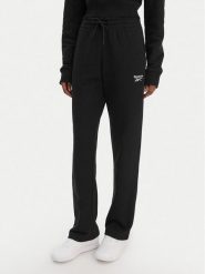 Reebok Spodnie dresowe Zuzanna RK25496CCW Czarny Regular Fit. Czarne spodnie dresowe damskie Reebok, xl, bez wzorów, z bawełny. Za 179.99 zł.