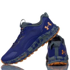 Buty Sportowe Męskie Under Armour Charged Bandit TR 2. Fioletowe obuwie do biegania damskie Under Armour. Za 360.80 zł.
