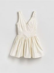 Kombinezon z bawełną - złamana biel. Kombinezony damskie Reserved, bez wzorów, z bawełny, bez kołnierzyka, bez ramiączek. Za 159.99 zł.