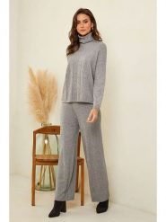 Soft Cashmere Spodnie w kolorze szarym rozmiar: 38/40. Szare spodnie materiałowe damskie Soft Cashmere, bez wzorów, z kaszmiru. Za 130.99 zł.