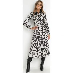 Czarno-Biała Sukienka Maxi Koszulowa Gojira. Białe sukienki damskie Born2be, na imprezę, s, bez wzorów, z satyny, eleganckie, bez kołnierzyka, bez ramiączek, maxi, koszulowe. W wyprzedaży za 159.99 zł.