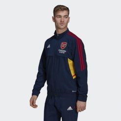 Kurtka do piłki nożnej męska Adidas Arsenal Presentation Condivo 2022/23. Niebieskie kurtki męskie Adidas, l, bez wzorów, z dresówki, bez kaptura. Za 319.85 zł.