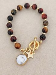 Luja Bijoux Pozłacana bransoletka z tygrysim okiem i perłą rozmiar: onesize. Brązowe bransoletki damskie Luja Bijoux, pozłacane. Za 65.85 zł.