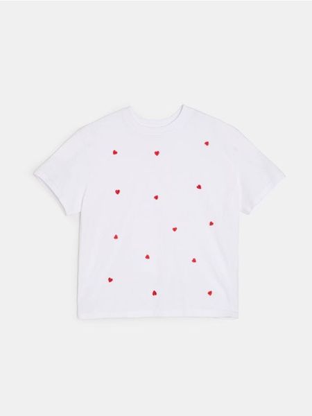 Bawełniana koszulka z krótkim rękawem w serca - kremowy. Białe koszulki dziewczęce Sinsay, l, bez wzorów, z bawełny, bez ramiączek. Za 15.99 zł.