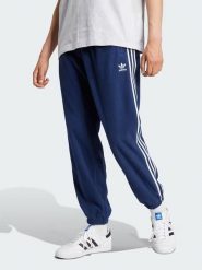 Adidas Spodnie dresowe w kolorze granatowym rozmiar: XS. Niebieskie spodnie dresowe męskie Adidas, bez wzorów, z dresówki. Za 118.56 zł.