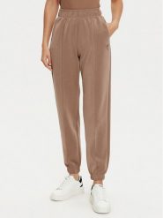 Guess Spodnie dresowe V5RB11 KCAY2 Brązowy Regular Fit. Brązowe spodnie dresowe damskie Guess, m, z aplikacjami, z dresówki. Za 239.99 zł.
