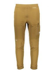 The North Face Spodnie funkcyjne "Soukuu" w kolorze żółtym rozmiar: M. Żółte spodnie materiałowe męskie The North Face, bez wzorów, sportowe. Za 591.60 zł.