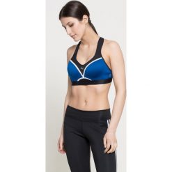 Puma - Biustonosz. Niebieskie biustonosze sportowe damskie Puma, bez wzorów, z elastanu. W wyprzedaży za 59.90 zł.