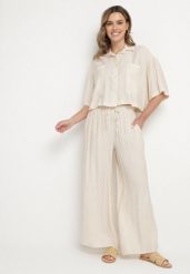 Beżowy Wiskozowy Komplet Oversize Koszula z Krótkim Rękawem i Spodnie Dovilissea. Brązowe koszule damskie Born2be, bez wzorów, z wiskozy, eleganckie. Za 119.99 zł.