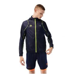Kurtka turystyczna męska Lacoste Sport Roland Garros. Niebieskie kurtki treningowe męskie Lacoste, na lato, m, z aplikacjami, z materiału, na fitness i siłownię. Za 567.00 zł.