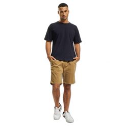 Szorty do joggingu z twillu Urban Classics Stretch. Brązowe szorty męskie Urban Classics, bez wzorów, eleganckie. W wyprzedaży za 112.00 zł.