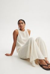 SPODNIE SUMMER ECRU XS - Flawless. Spodnie materiałowe damskie Flawless, w ażurowe wzory, z dzianiny, eleganckie, z podwyższonym stanem. Za 446.00 zł.