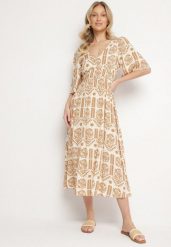 Ciemnobeżowa Sukienka Wiskozowa Rozkloszowana z Odkrytymi Plecami w Print Boho Turaisa. Brązowe sukienki damskie Born2be, na co dzień, l, bez wzorów, z wiskozy, boho, bez kołnierzyka, bez ramiączek, midi, proste. W wyprzedaży za 63.99 zł.