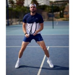 Koszulka sportowa męska Performance. Białe t-shirty sportowe męskie NORDICDOTS, l, z elastanu, bez ramiączek. Za 230.00 zł.