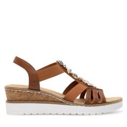 Sandały Rieker. Brązowe sandały damskie Rieker, bez wzorów, bez obcasa, na koturnie. Za 299.99 zł.