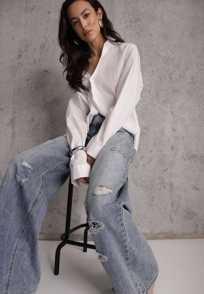 Niebieskie Szerokie Jeansy Palazzo z Bawełny z Dziurami i Przetarciami Erilenna. Niebieskie jeansy damskie Renee, z podwyższonym stanem. Za 149.99 zł.