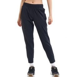 Spodnie sportowe damskie Under Armour Unstoppable Jogger. Czarne spodnie dresowe damskie Under Armour, xl, z dresówki, na fitness i siłownię. Za 507.00 zł.