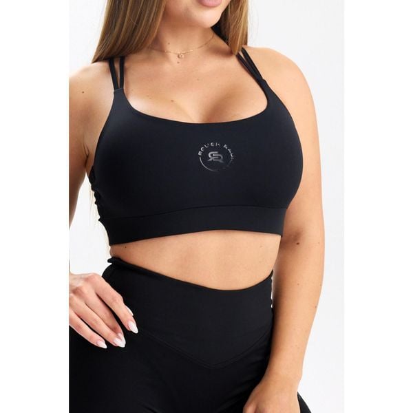 Stanik sportowy fitness Rough Radical Pure Flow Bra. Czarne biustonosze sportowe damskie ROUGH RADICAL, bez wzorów. W wyprzedaży za 110.42 zł.