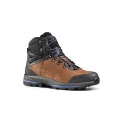 Buty trekkingowe wysokie TREK 100 skóra męskie. Niebieskie buty trekkingowe męskie FORCLAZ, z gumy, bez zapięcia, trekkingowe. Za 399.99 zł.