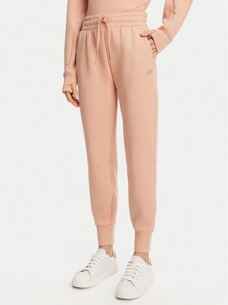 Lacoste Spodnie dresowe XF0343 Pomarańczowy Regular Fit. Brązowe spodnie dresowe damskie Lacoste, bez wzorów, z bawełny. Za 329.99 zł.