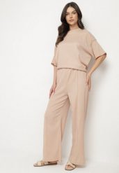 Beżowy Komplet o Kroju Oversize Szerokie Spodnie i T-shirt Natelera. Brązowe spodnie materiałowe damskie Born2be, bez wzorów, eleganckie. Za 89.99 zł.