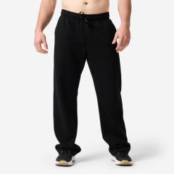 Spodnie dresowe męskie Domyos. Czarne spodnie sportowe męskie DOMYOS, z bawełny. Za 149.99 zł.