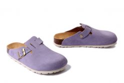 DR. BRINKMANN 600154-59 lavendel, klapki damskie. Fioletowe klapki damskie Dr. Brinkmann, bez wzorów, ze skóry, bez obcasa. Za 284.90 zł.