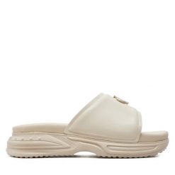 Klapki Calvin Klein Jeans. Klapki damskie Calvin Klein Jeans, bez wzorów, z jeansu, bez obcasa. Za 319.99 zł.