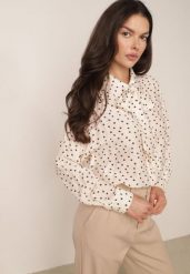 Beżowa Zwiewna Koszula z Wiskozy w Groszki z Kokardką pod Szyją Semone. Brązowe koszule damskie Born2be, l, bez wzorów, z jeansu, eleganckie, bez kołnierzyka, bez ramiączek. Za 119.99 zł.